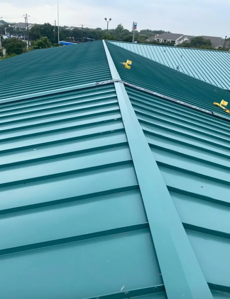 Green commercial metal roof ridge and valley for Metal Roof Repair in San Luis